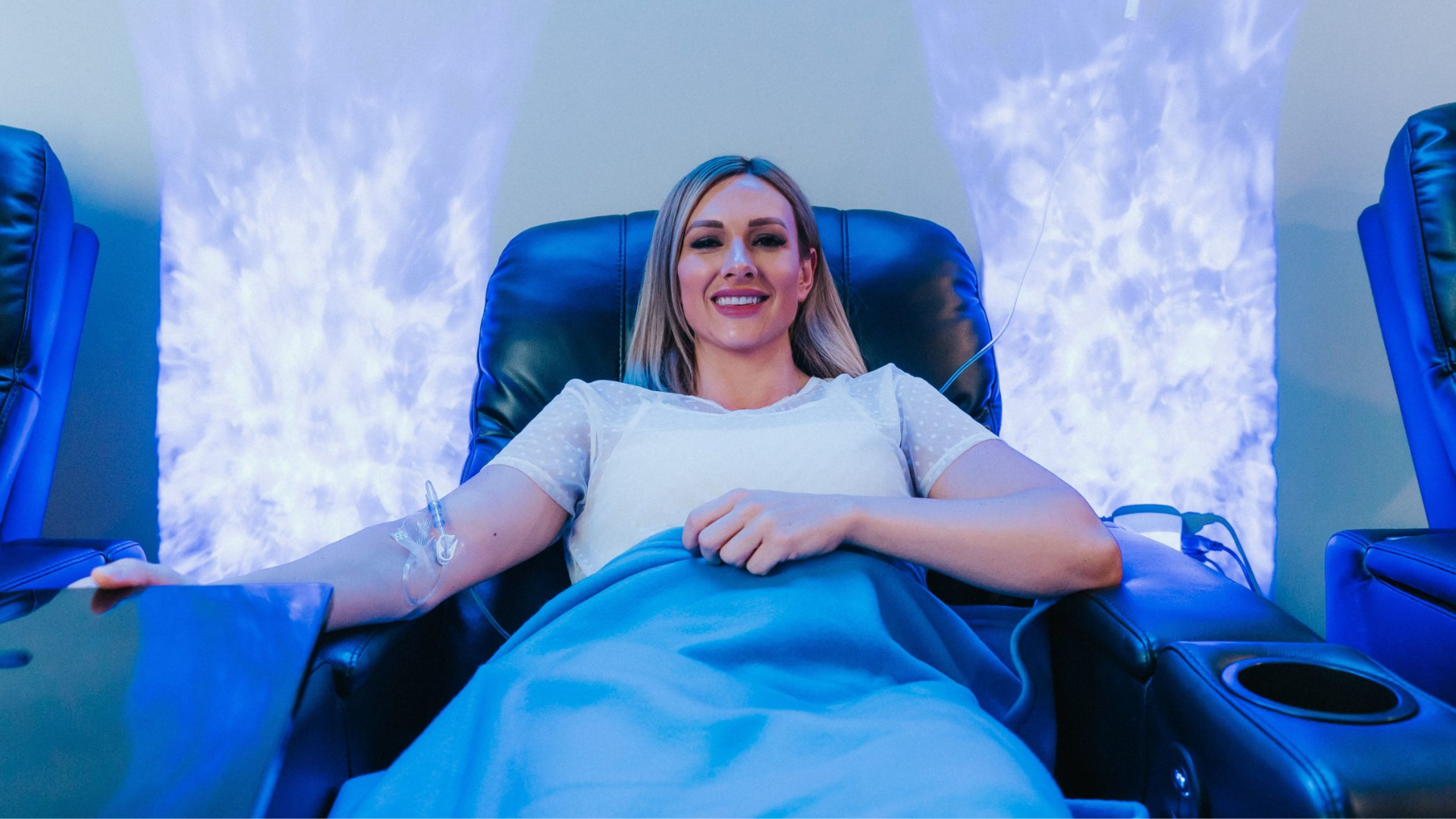 Patient receiving IV infusion therapy for hydration and nutrients